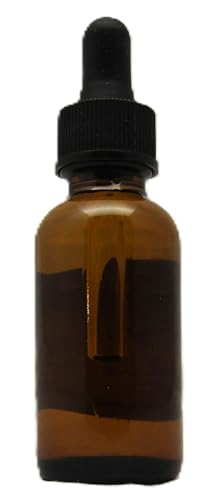 Amber glass bottle with dropper containing apples and spice simmer fragrance oil for home scenting