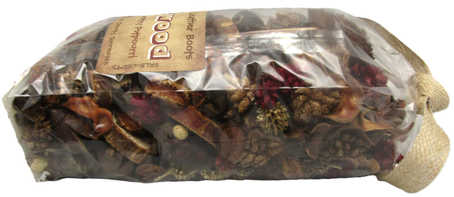 Handcrafted cedarwood potpourri mix with pine cones and dried natural botanicals in a clear drawstring bag