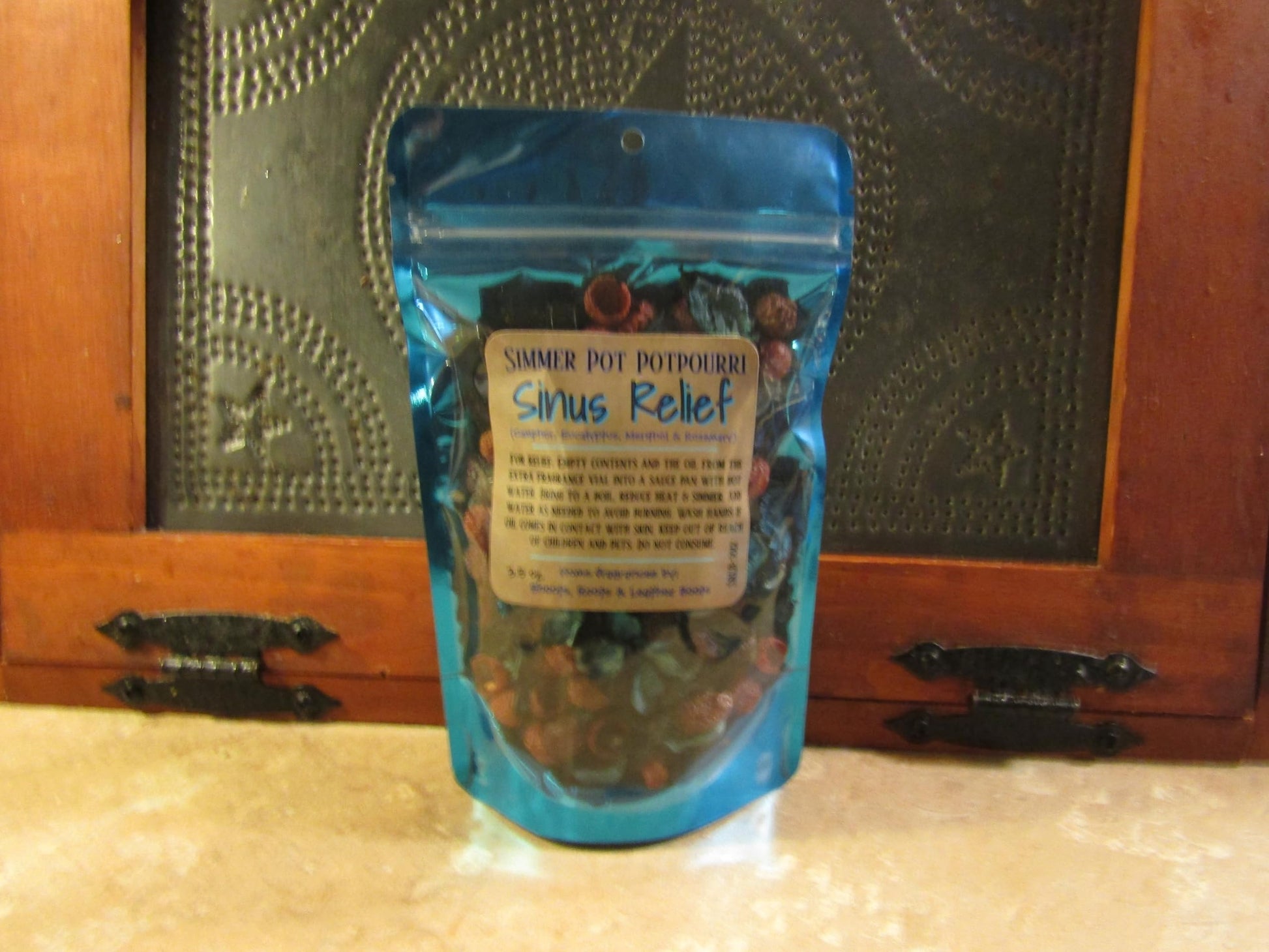 Herbal simmering potpourri Sinus Relief blend in blue resealable pouch from Shoots Roots and Leather Boots