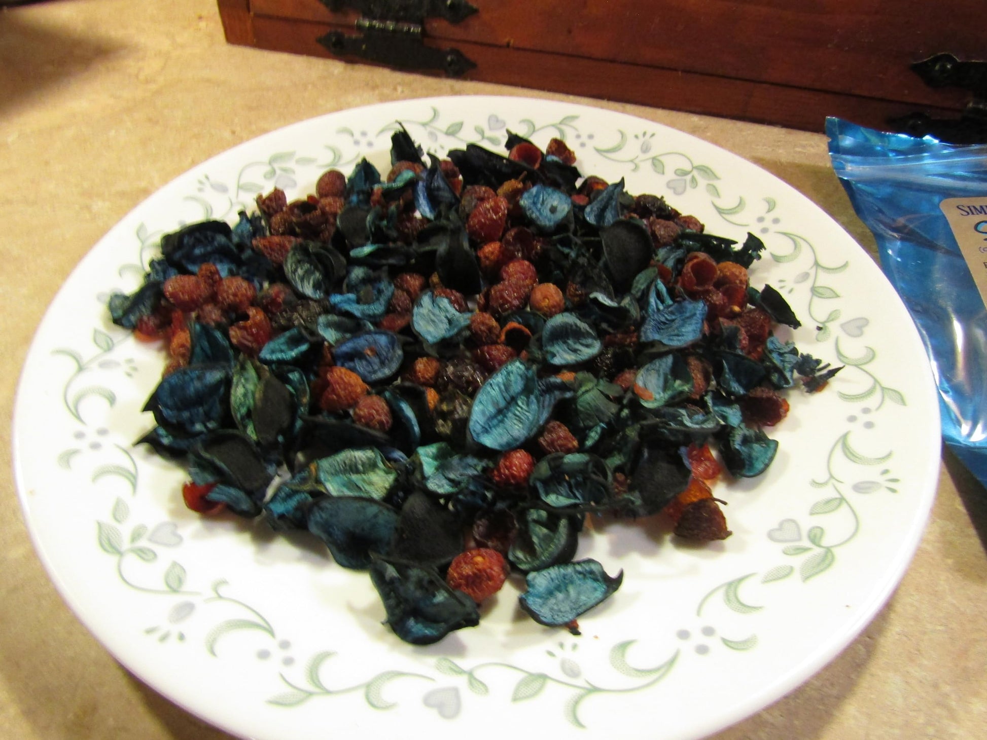 Herbal simmering potpourri on a white decorative plate for home fragrance and decor