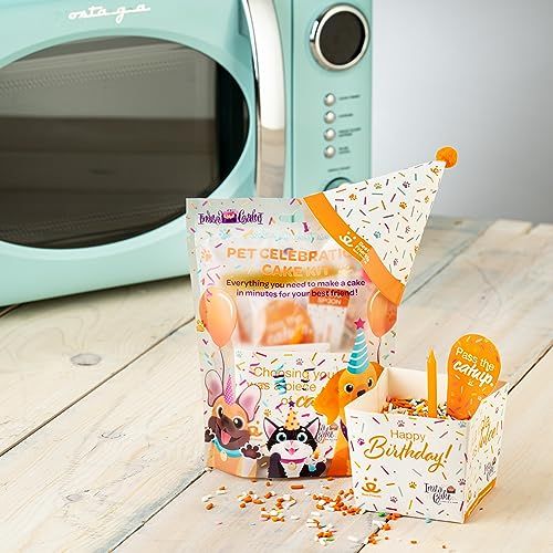 Instacake Cards pet celebration cake kit with party hat and birthday candles on wooden table