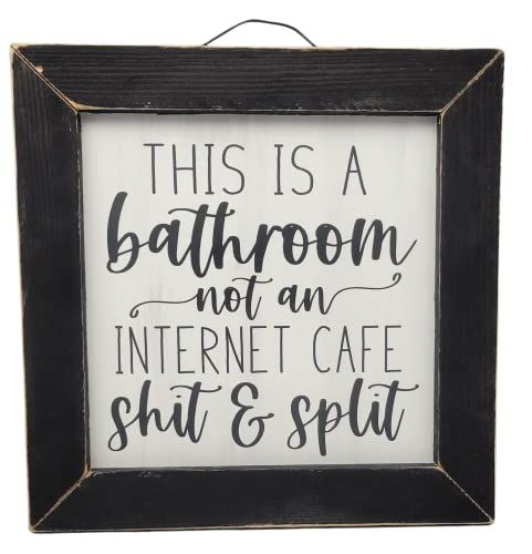 Funny bathroom wall art with black wooden frame and humorous quote for home decor