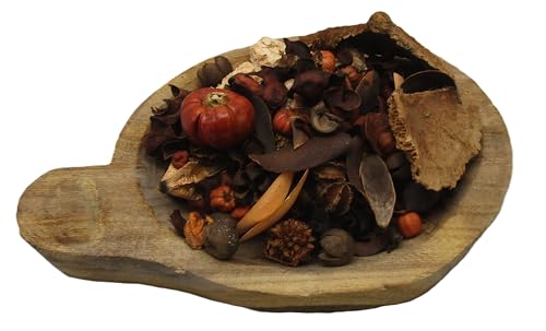 Pumpkin spice potpourri with dried leaves and small pumpkin decoration in wooden bowl by Just Browsing