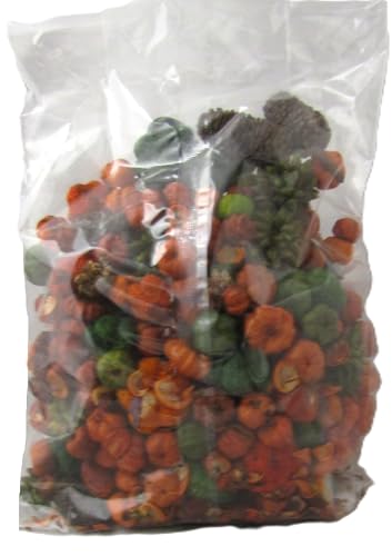 Clear plastic bag of handmade potpourri rustic blend with orange green dried petals and pine cones for home decor