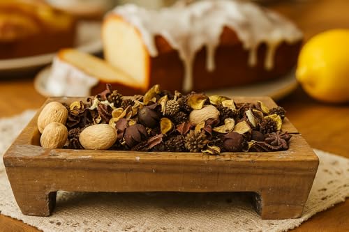 Lemon pound cake potpourri in wooden tray with lemon pound cake and lemon in background
