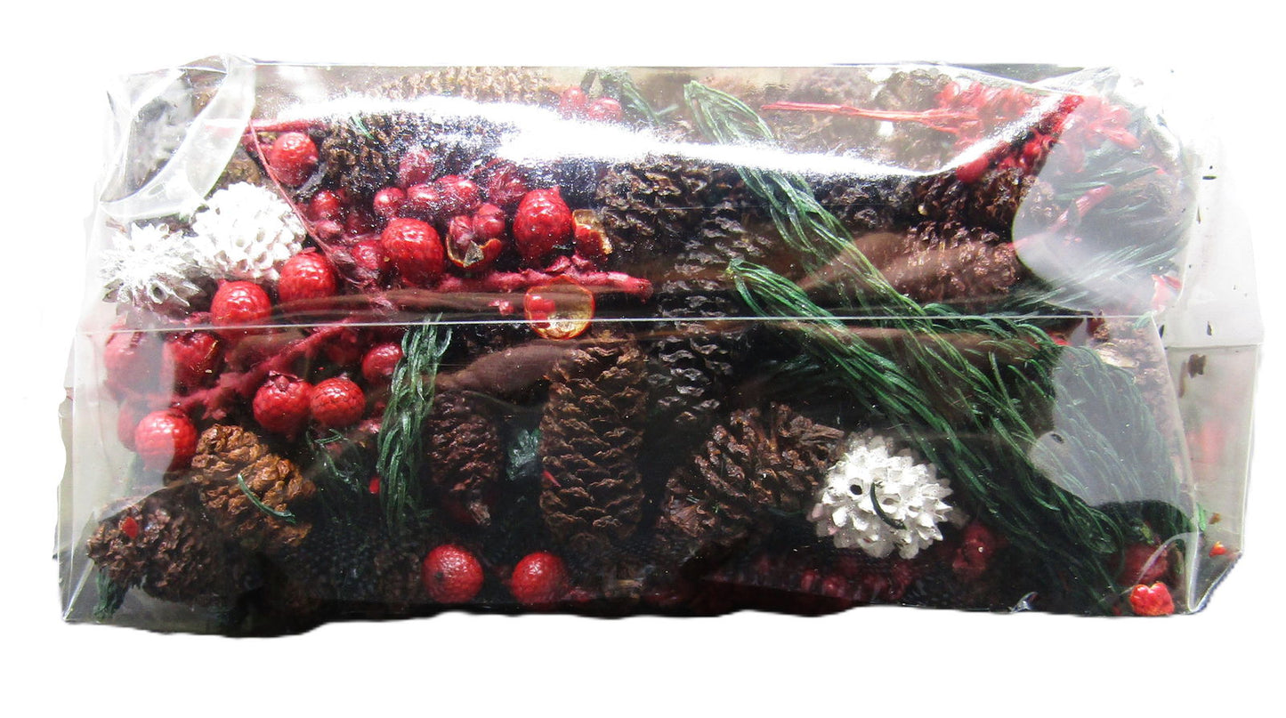 Old Candle Barn potpourri with red berries, pinecones, and greenery for home fragrance