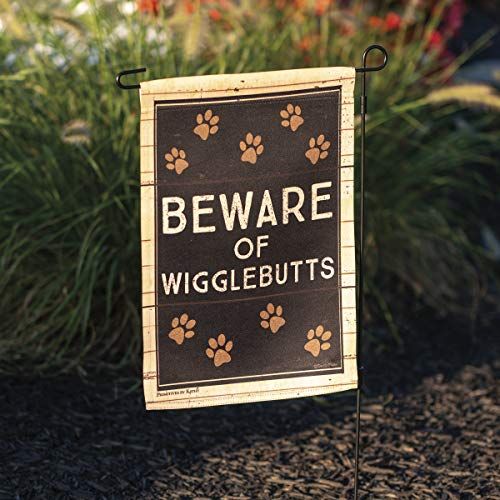 Primitives by Kathy pet themed garden decor Beware of Wigglebutts flag with paw prints on a garden stand