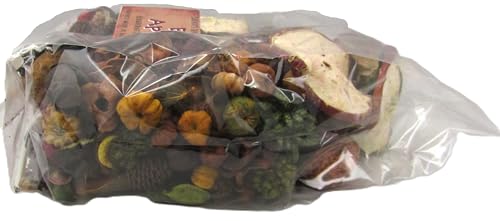 Clear plastic bag of rustic autumn potpourri handmade mix with dried apple slices mini pumpkins and pine cones