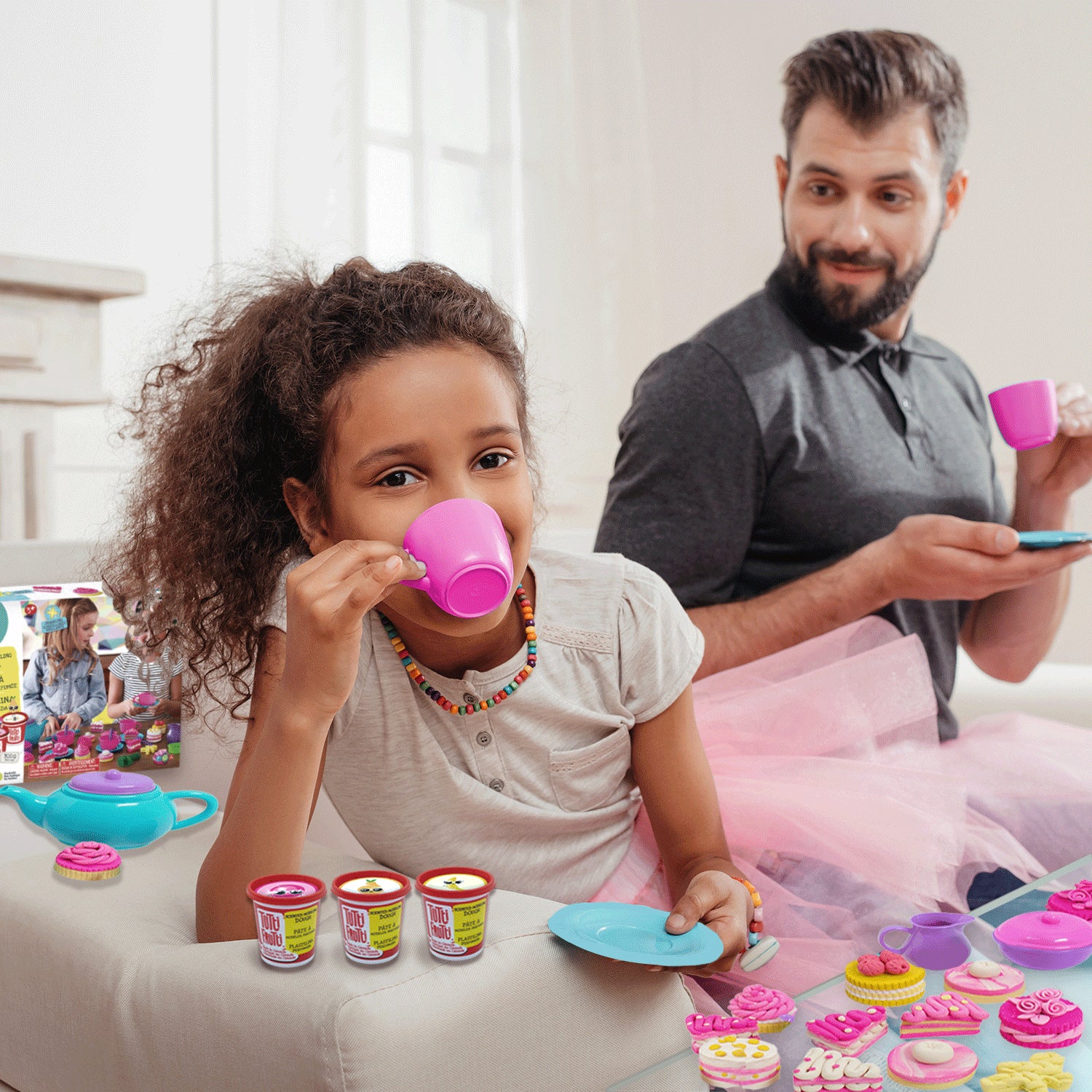 Tutti Frutti Sparkling Tea Time set pretend tea party toy with child and father playing colorful cups and desserts