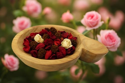 Decorative potpourri for living room in a wooden bowl with red and cream dried flowers