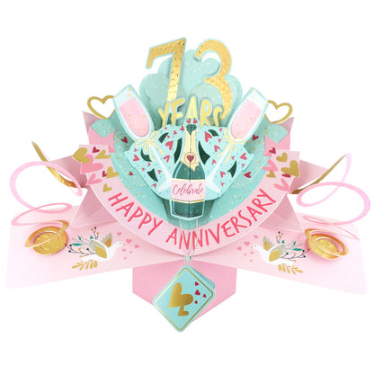 73rd anniversary pop up card featuring balloons, champagne, and a festive celebration design