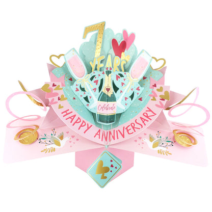 7th anniversary pop up card featuring champagne, hearts, and a festive design for celebrating love