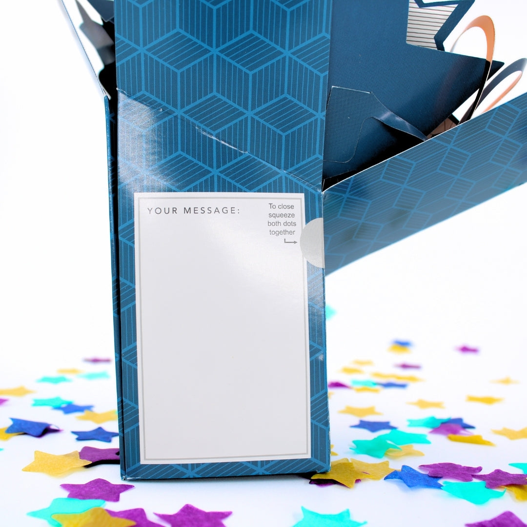 Blue gift box with a message card on a white background with colorful confetti