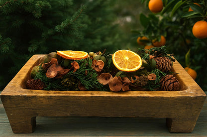Balsam Orange Potpourri Bowl Filler with dried orange slices pinecones and greenery in wooden bowl