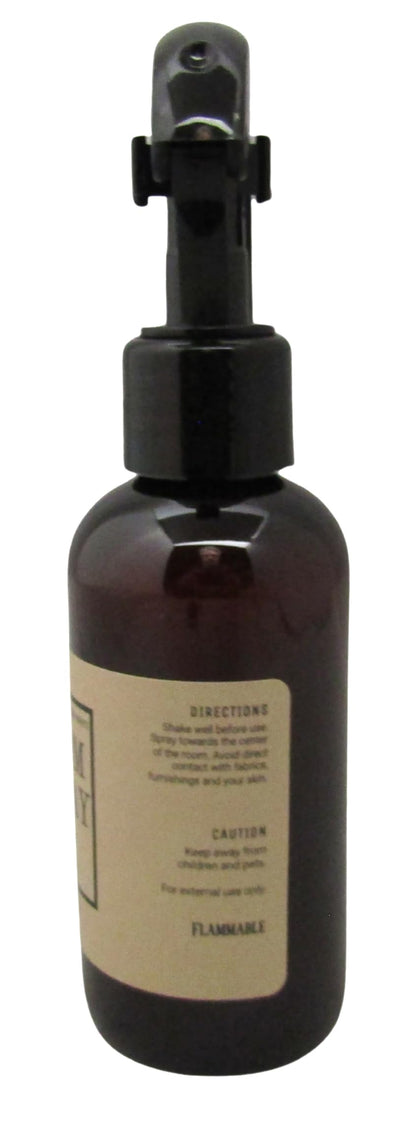 Shoots, Roots & Leather Boots Key Lime Room Spray in a dark amber bottle with a spray nozzle