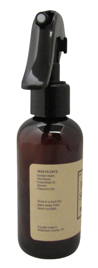 Shoots, Roots & Leather Boots Patchouli Room Spray in amber bottle with spray nozzle for a calming scent