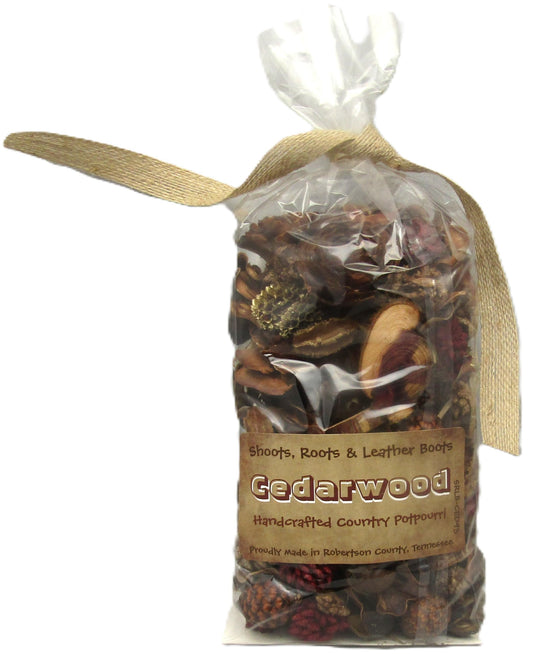 Handcrafted cedarwood potpourri in clear bag with natural ribbon by Shoots Roots and Leather Boots