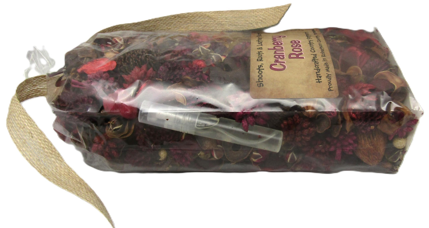 Shoots Roots Leather Boots cranberry rose potpourri in a clear bag with natural dried floral elements