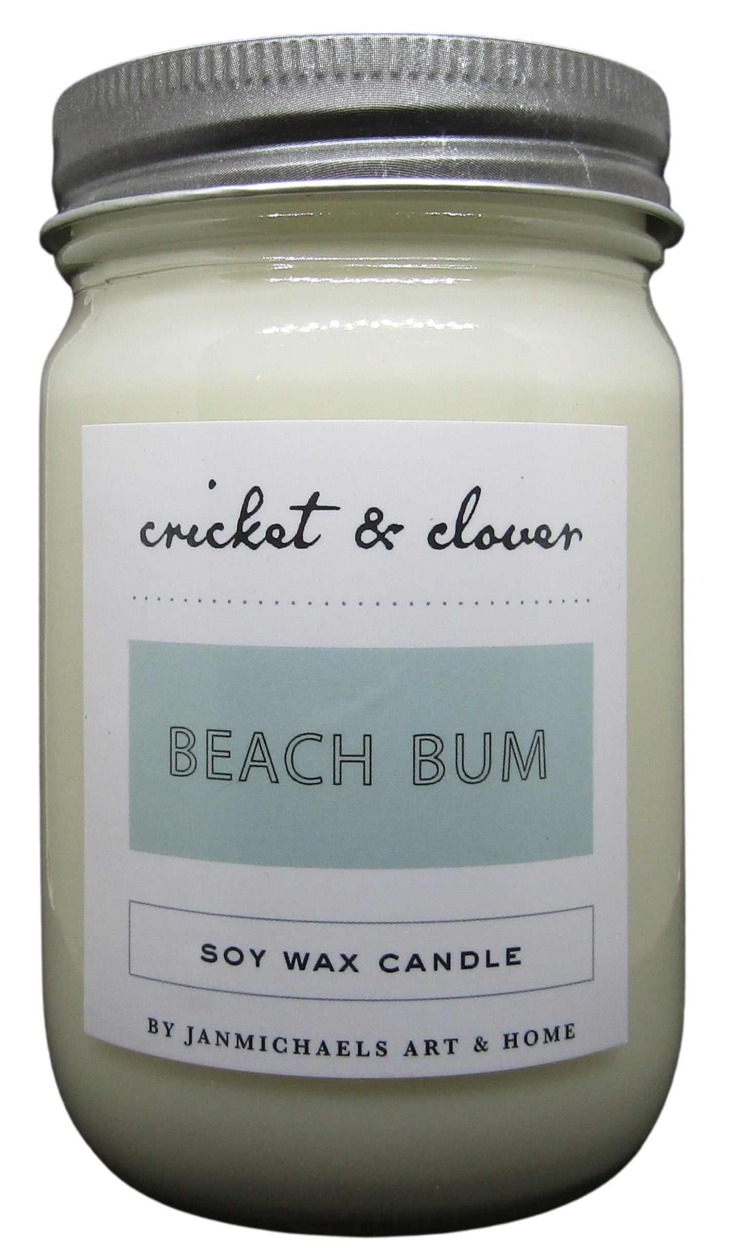 Cricket & Clover Beach Bum candle wax soy in a white jar with a silver lid for a refreshing scent