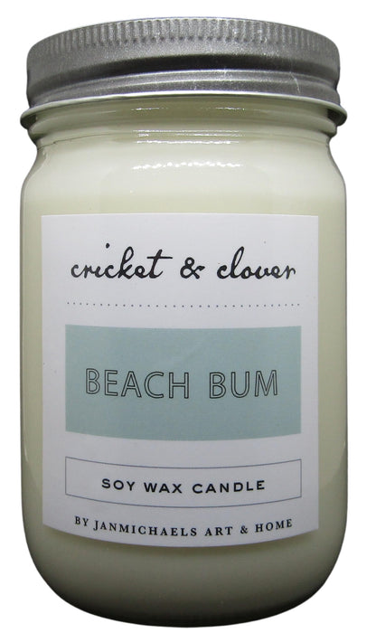 Cricket & Clover Beach Bum candle wax soy in a white jar with a silver lid for a refreshing scent