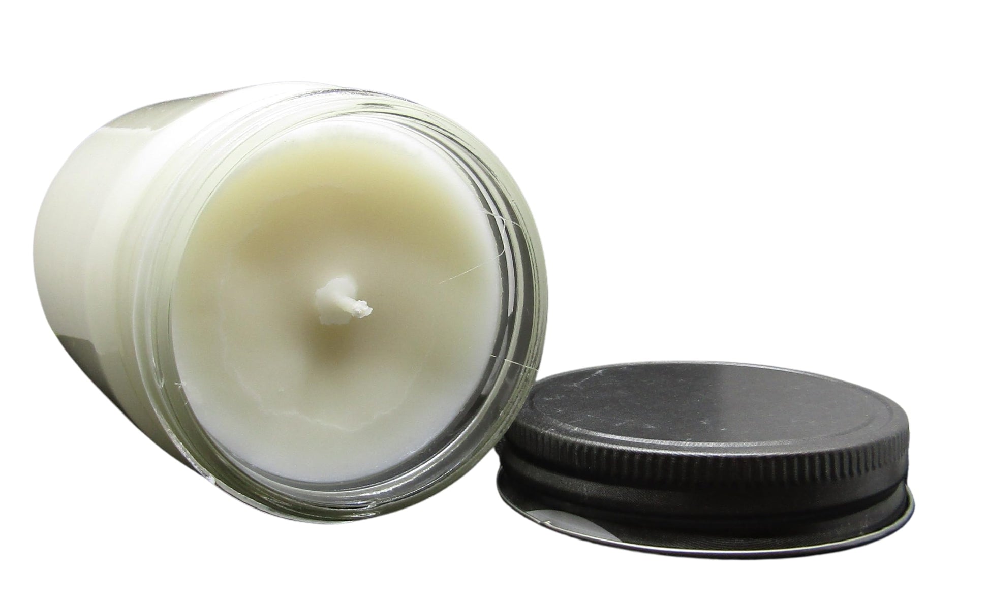 Cricket & Clover candle wax soy in a clear jar with a black lid, perfect for a soothing ambiance