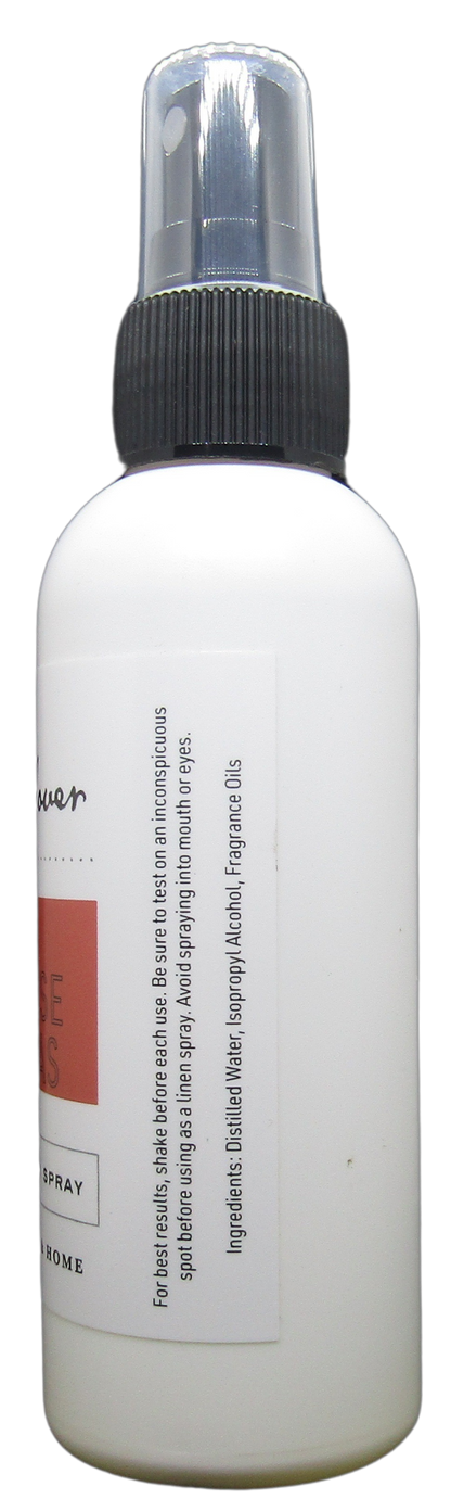 Cricket and Clover holiday potpourri room spray in white plastic bottle with black spray top and clear cap