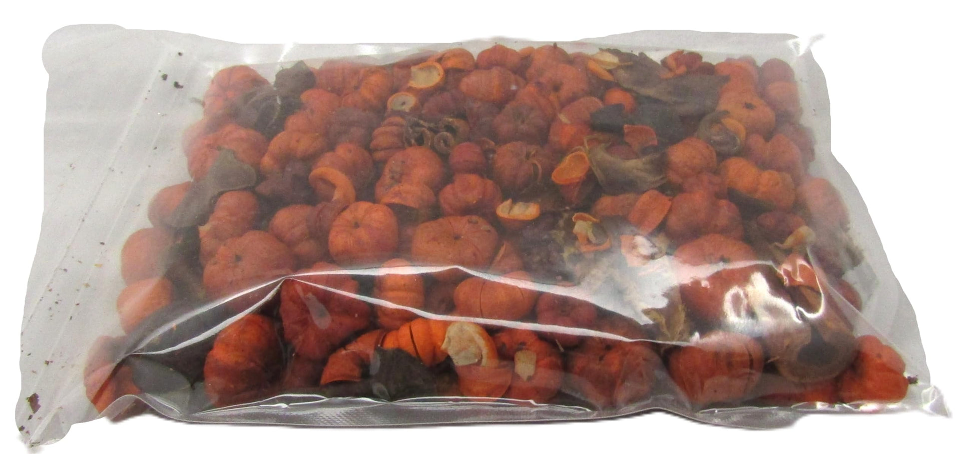 Fall potpourri with orange putka pods in a clear plastic bag for autumn home decor