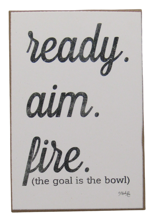 Ready aim fire bathroom sign featuring the phrase the goal is the bowl in stylish typography