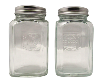 Home Essentials glass salt and pepper shakers with clear glass bodies and metal screw-on lids