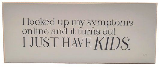 Humorous parenting quote sign by Jan Michaels Art with the text about kids as symptoms