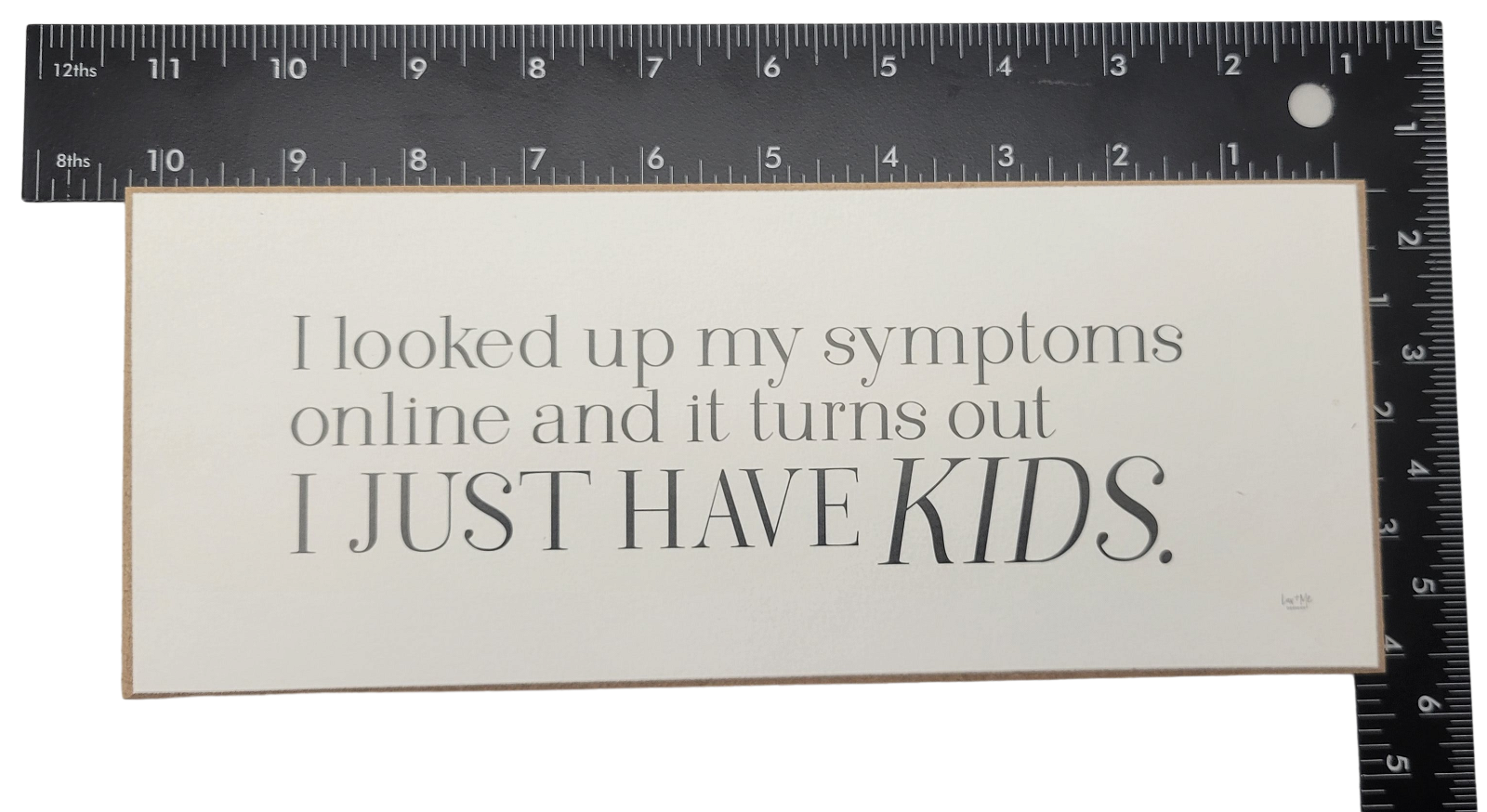 Humorous parenting quote sign by Jan Michaels Art Home reads I just have kids with black text on white background