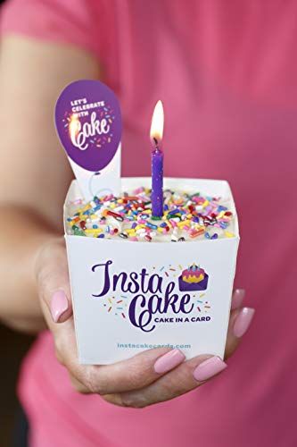 Person holding Instacake Cards small cake box with lit purple candle sprinkles and topper party favor cake kit for events