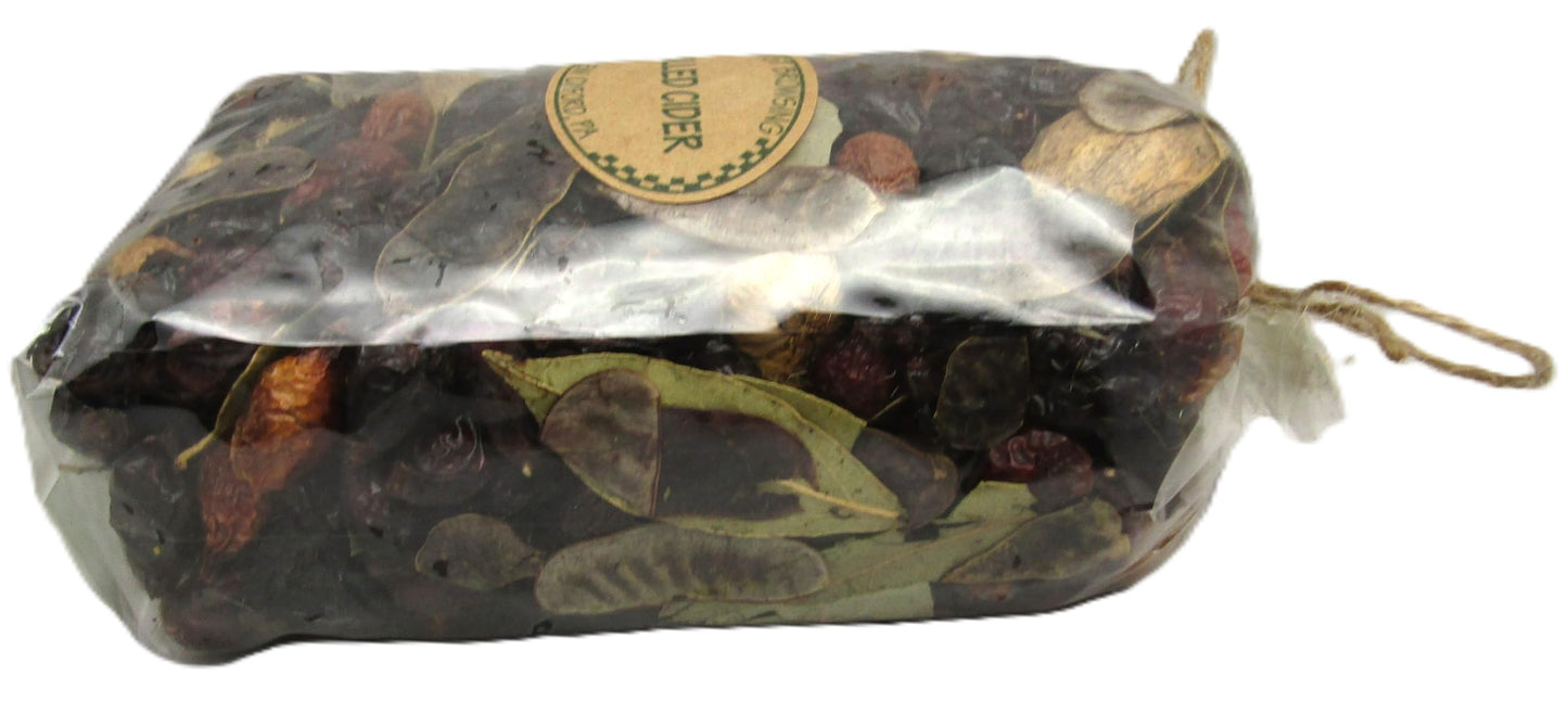 Just Browsing mulled cider potpourri in a clear package, featuring dried fruits and spices for home fragrance