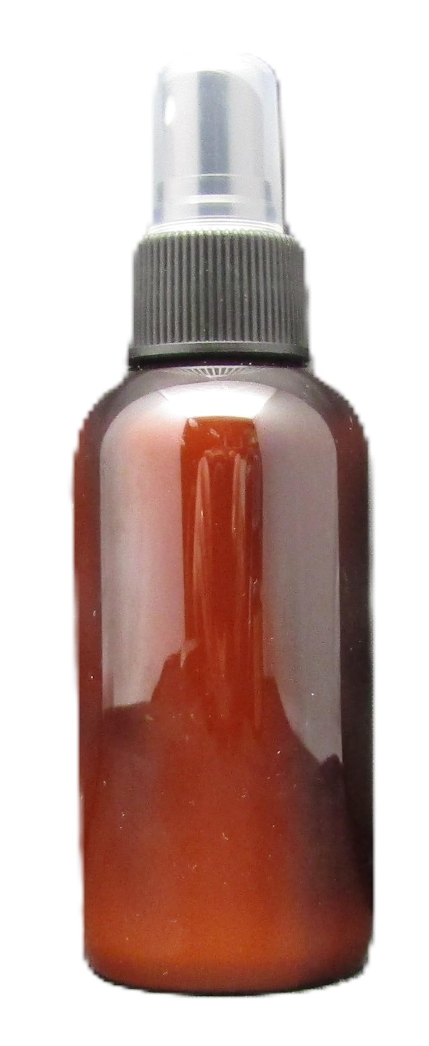 Just Browsing Orange Clove Room Spray in a sleek brown bottle for a refreshing scent