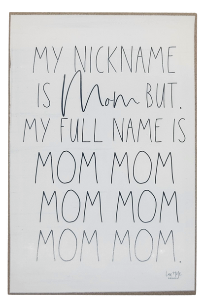 Mom wood block sign with humorous quote about mom nicknames in black lettering on white background