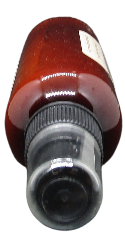 Brown bottle with black spray cap containing autumn room spray for home by Old Candle Barn