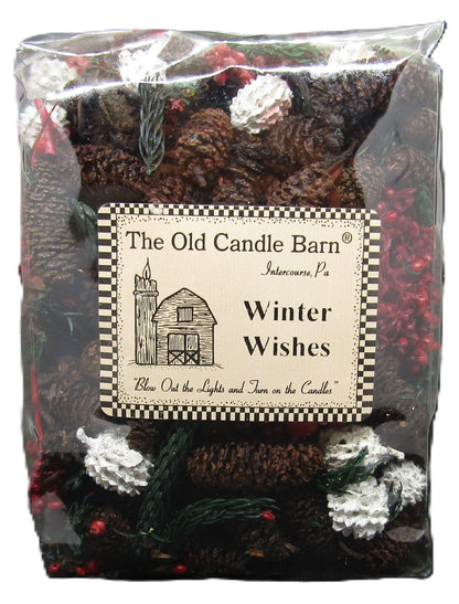 Old Candle Barn potpourri 'Winter Wishes' featuring pinecones and festive botanicals in a decorative bag