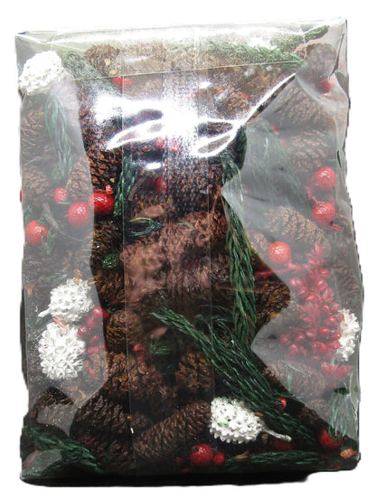 Old Candle Barn potpourri in a clear bag featuring pine cones and red berries for natural scent