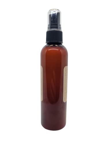 Old Candle Barn pumpkin spice room spray in amber bottle with black spray top for home fragrance