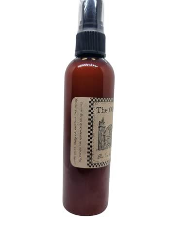 Old Candle Barn pumpkin spice room spray in a brown spray bottle with black top and vintage label