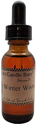 Old Candle Barn winter wishes fragrance oil in an amber dropper bottle for enhancing potpourri scents