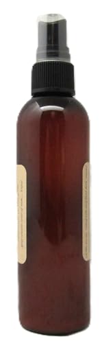 Old Candle Barn winter wishes room spray in an amber bottle for a cozy winter ambiance