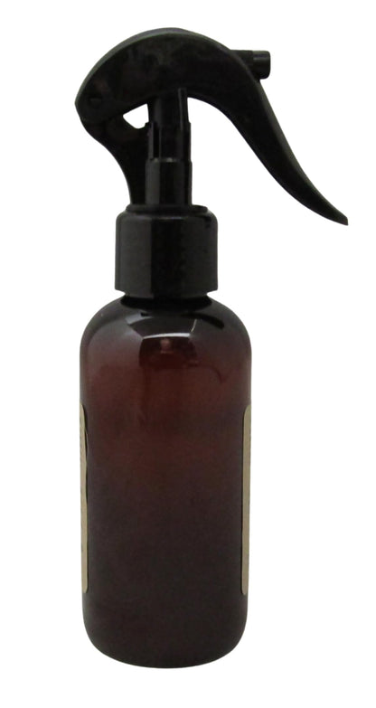 Shoots, Roots & Leather Boots Peach Room Spray in a dark amber bottle for a refreshing aromatic experience