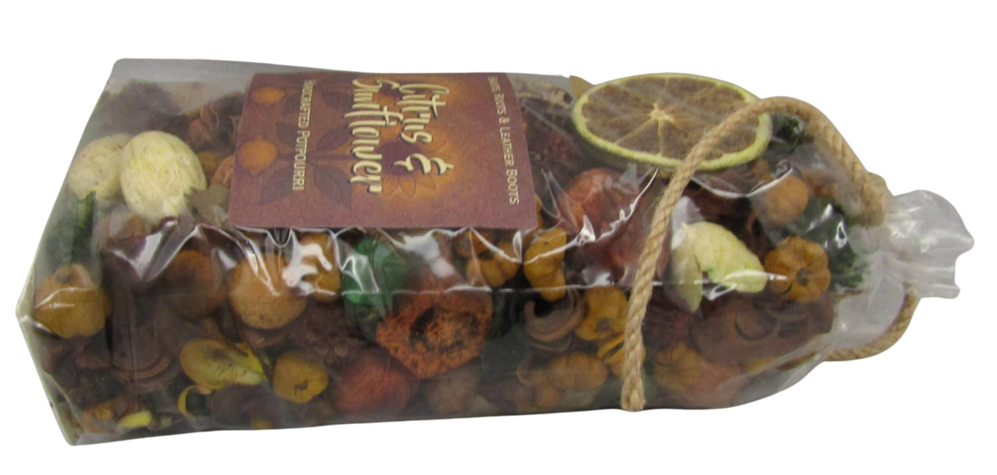Shoots, Roots & Leather Boots Citrus Potpourri in a clear bag, featuring dried citrus and floral elements