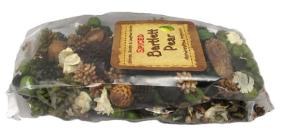 Spiced pear potpourri in a clear bag featuring earthy textures and natural scents for home fragrance