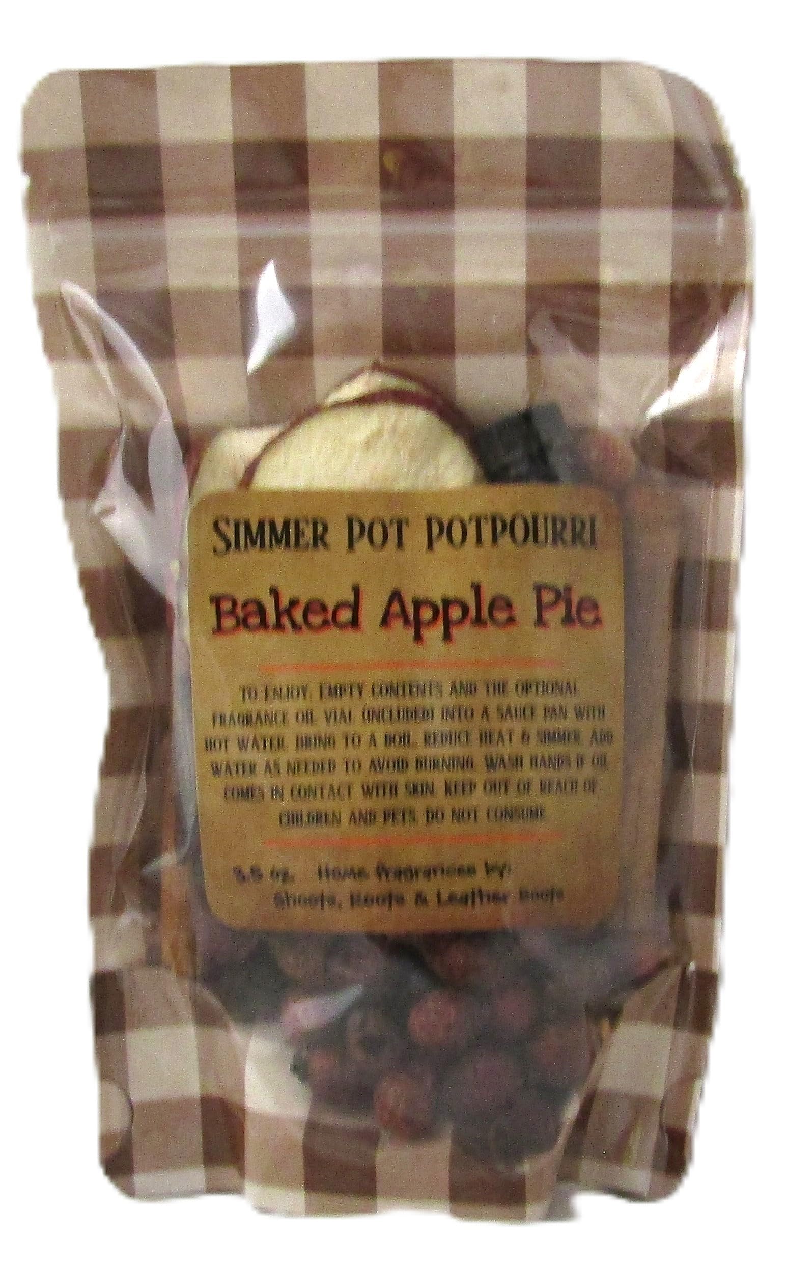 Gingham pouch of apple pie simmer potpourri showing dried apple slices cranberries and cinnamon sticks