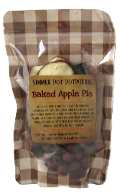 Gingham pouch of apple pie simmer potpourri showing dried apple slices cranberries and cinnamon sticks