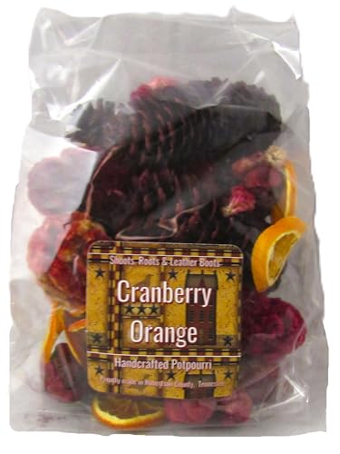 Cranberry Orange Potpourri in clear plastic bag with dried orange slices pine cones and red petals