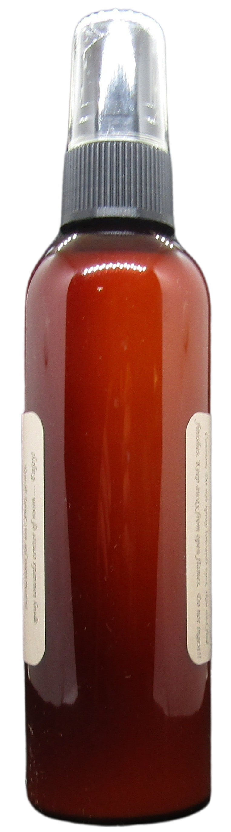 Old Candle Barn orange spice room spray in amber plastic bottle with clear spray top and side labels