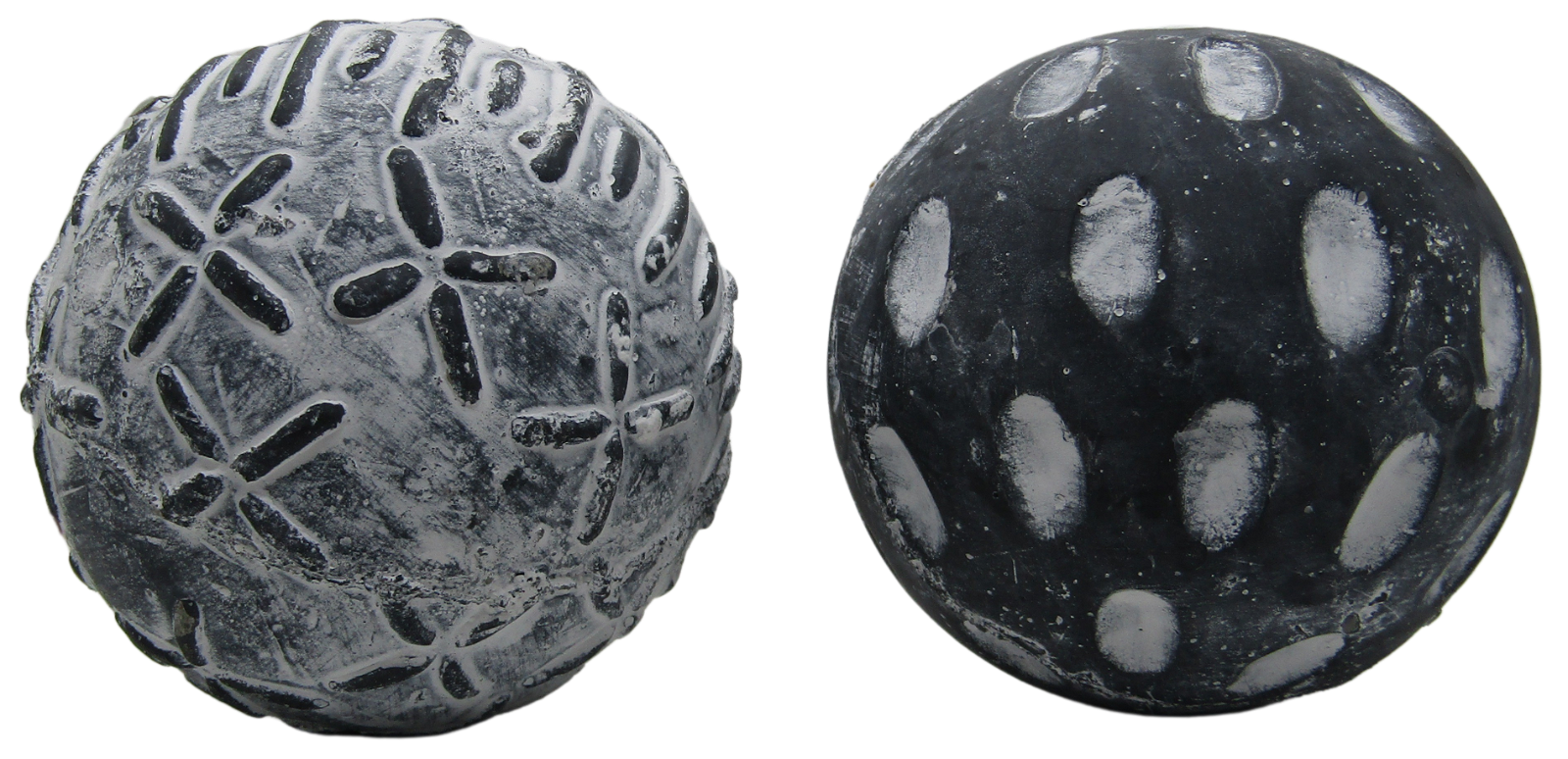 Two textured black and gray concrete garden spheres set decorative outdoor yard and patio accents
